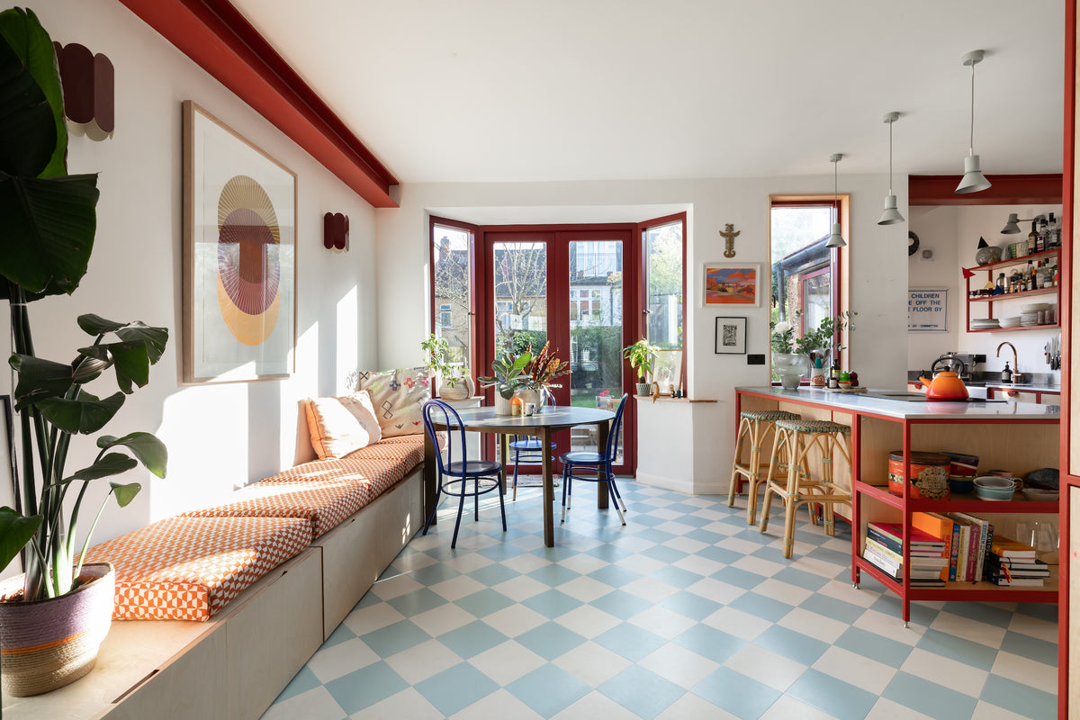 family kitchen, open plan built in seating kitchen island, red aluminium windows and steel beam 