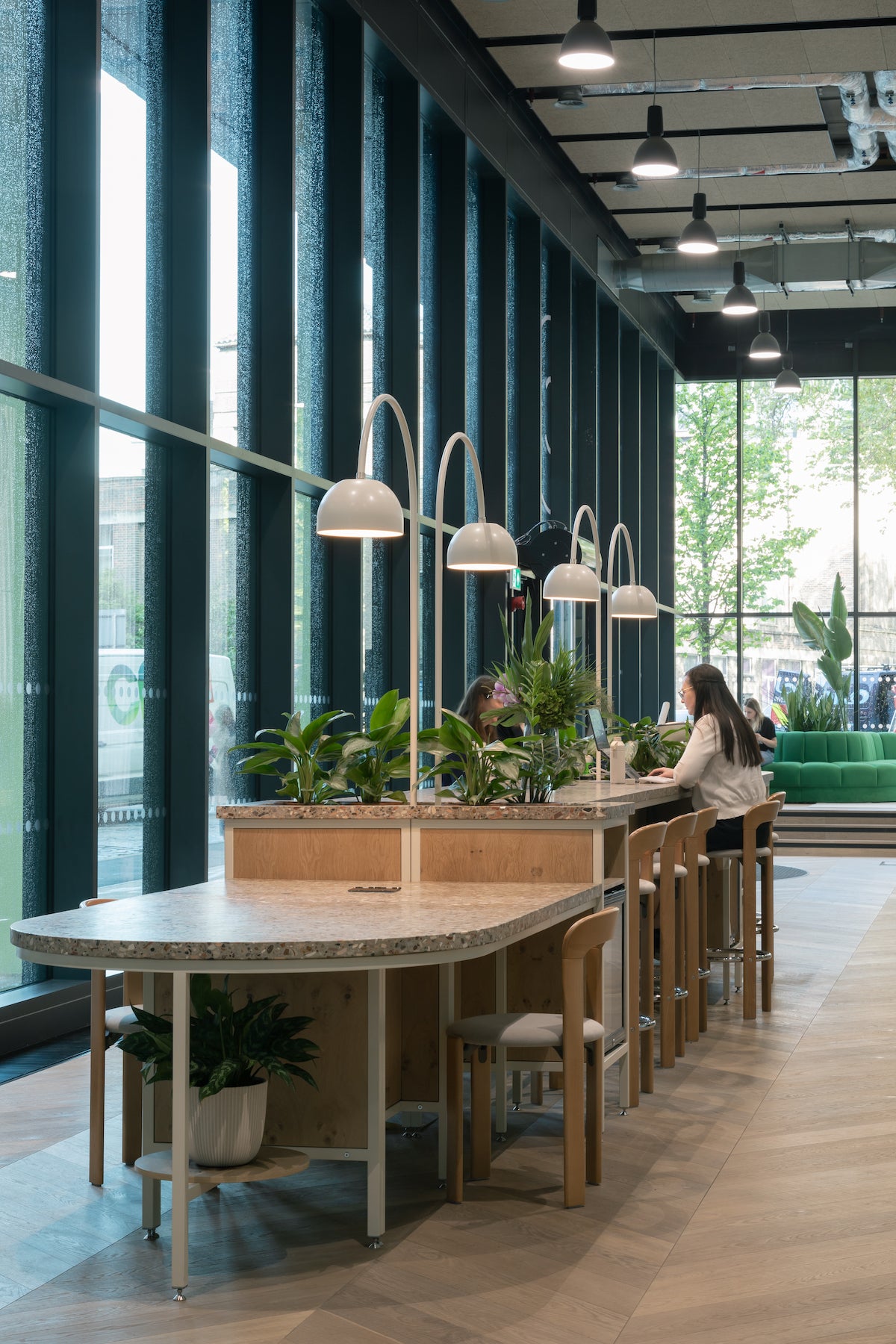 large reception desk, bespoke zero lights, curved steel frame work, oak fronts 