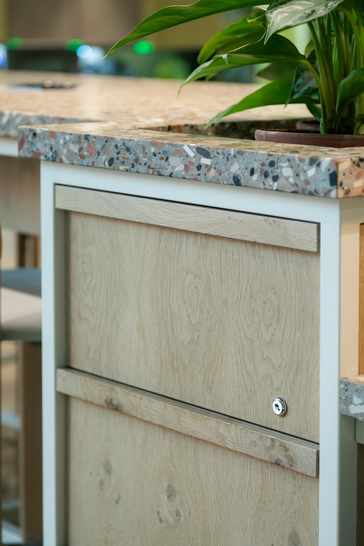 Steel frame drawers with oak fronts. Terrazzo work top 