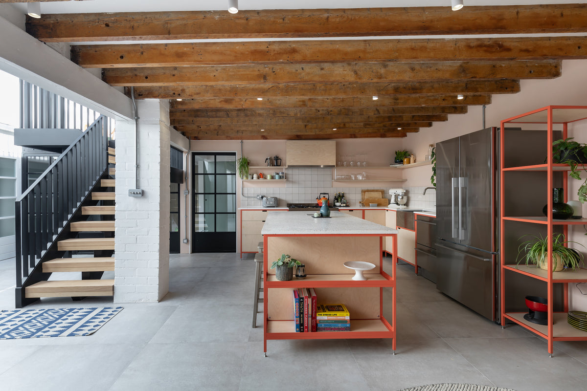 Open plan loft living kitchen, free standing kitchen units in powder-coated frames RAL 3022