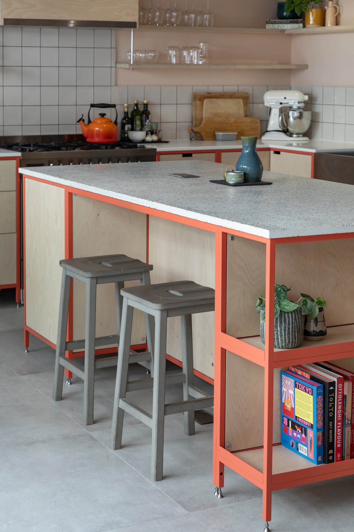 bespoke kitchen island with metal frame powder coated in RAL 3022 with terrazzo style work top from Durat 