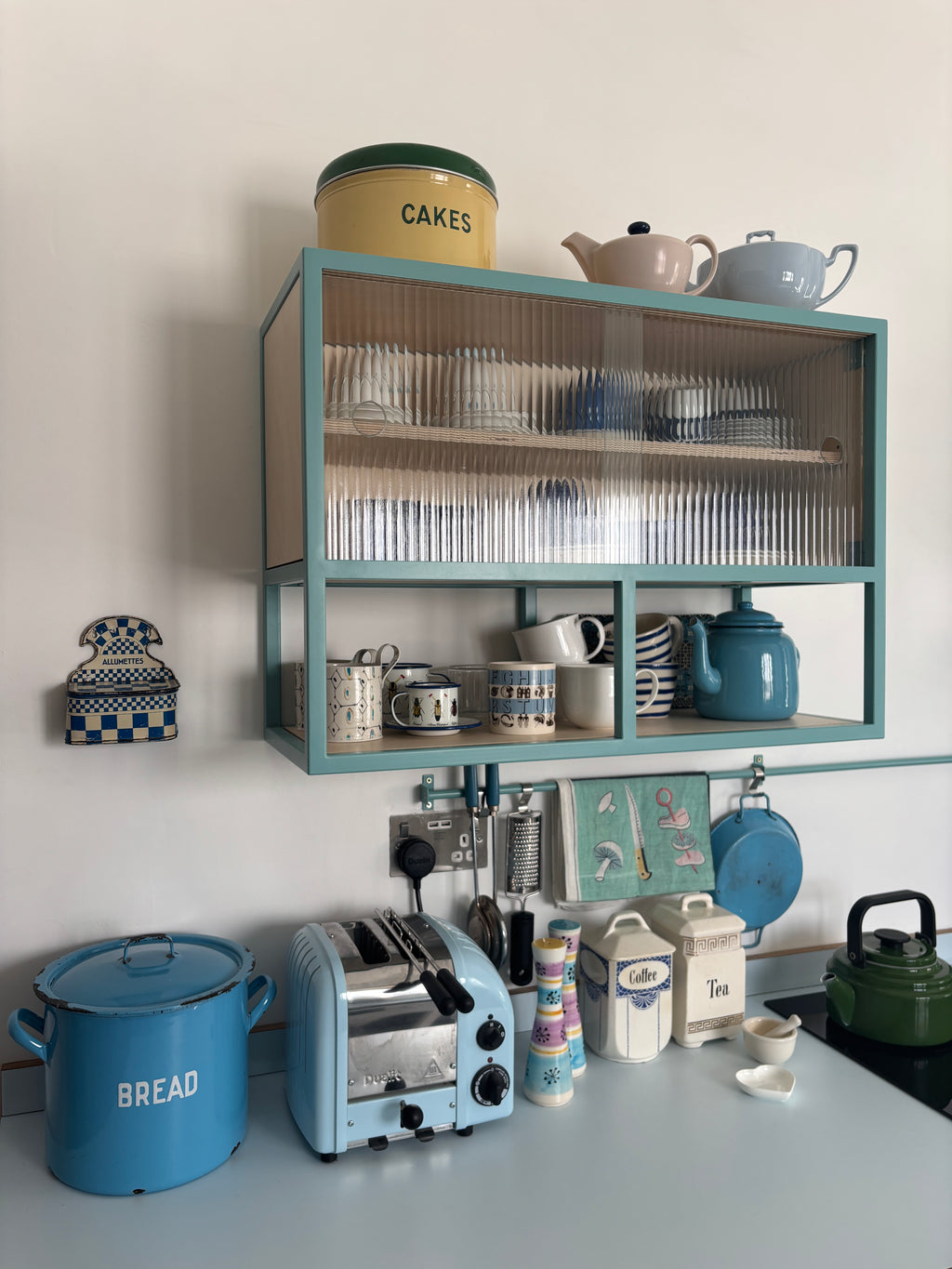 Reed Glass & Metal Wall Cabinet.